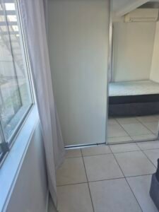 Cleaned built-in wardrobe and mirrored robe doors