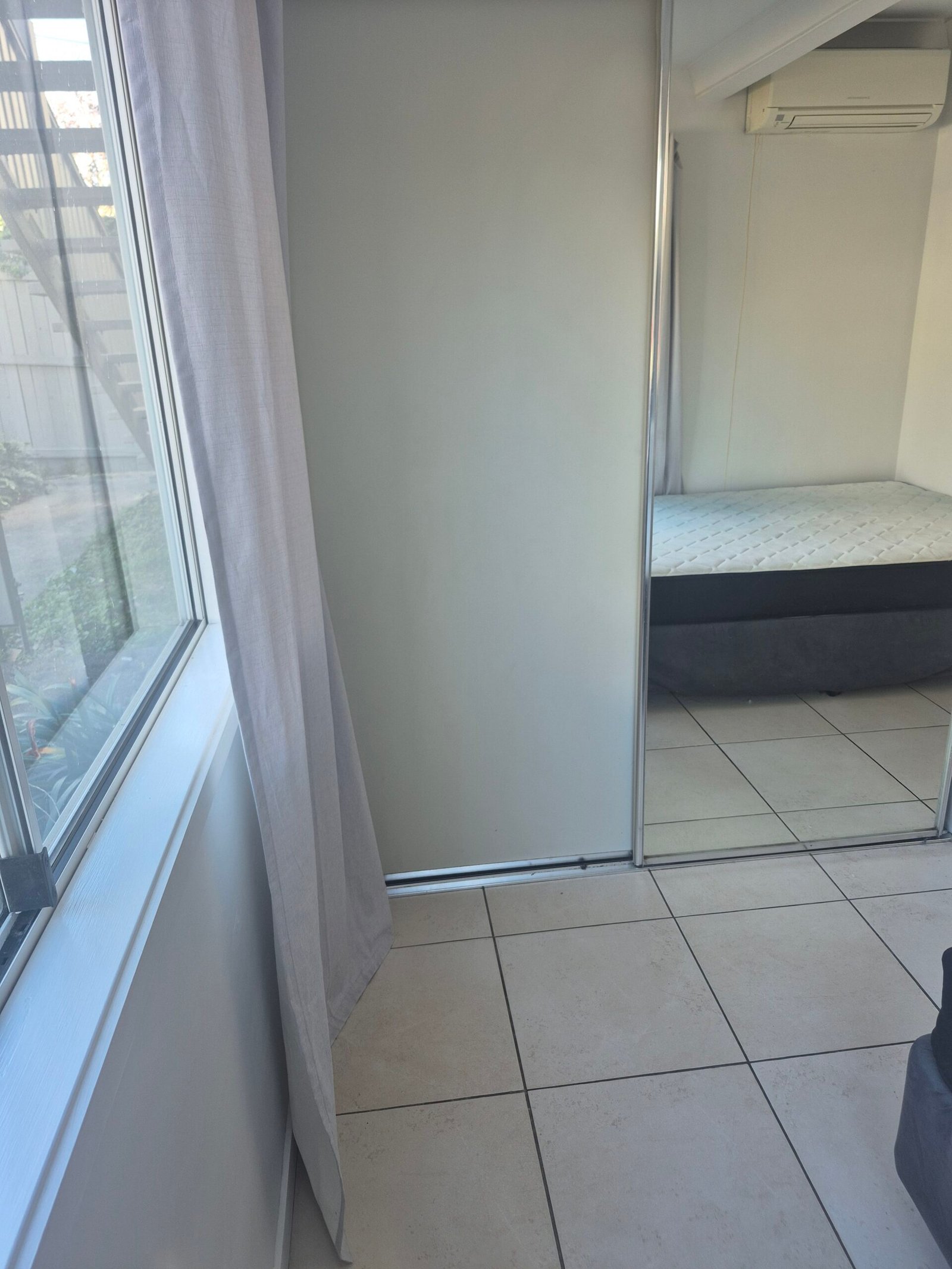 Cleaned built-in wardrobe and mirrored robe doors