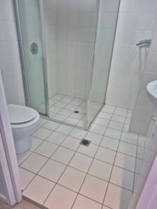 Sparkling clean bathroom shower screen and tiles