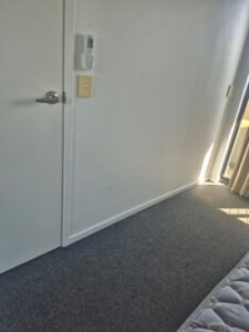 Clean bedroom carpet and doorway