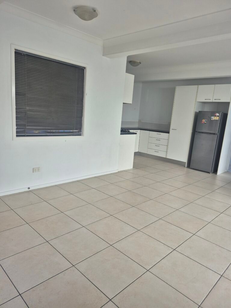 Open-plan living and kitchen area cleaned