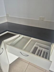 Kitchen drawer and countertop cleaned to bond clean standard
