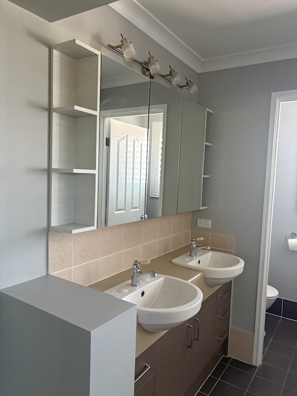 Bathroom double vanity and mirror cleaned